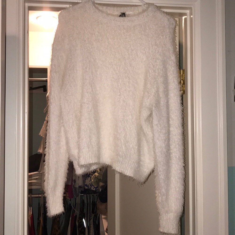 white fuzzy sweater